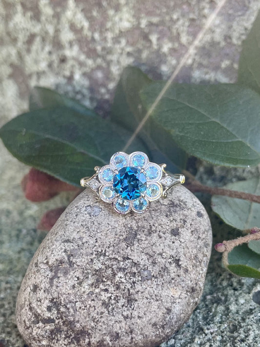 9ct Yellow & White Gold London Blue Topaz, Blue Topaz & Diamond 'Flower' Ring